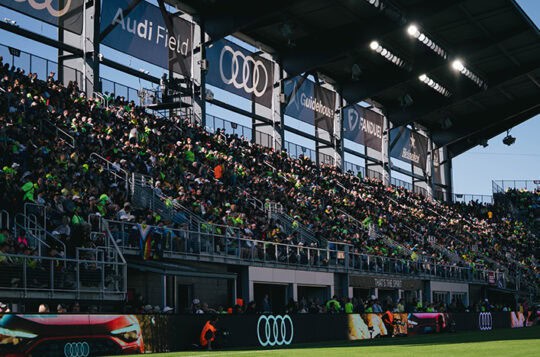 Fans at Audi Field watching Washington Spirit